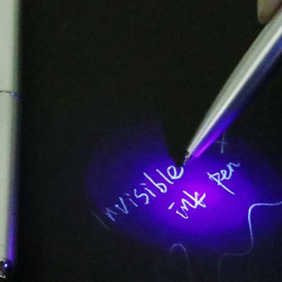 Invisible ink pen with light