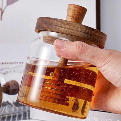 Glass jar with wooden dipper
