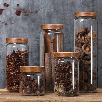 Glass jars with wooden lids